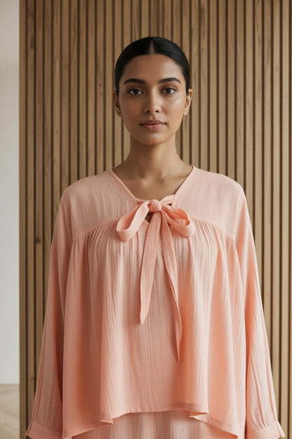 Close-up of the model wearing Fuzzy Peach Loungewear | Organic Cotton | Women